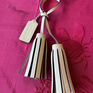 Coach Cream and Black Tassels and Tag